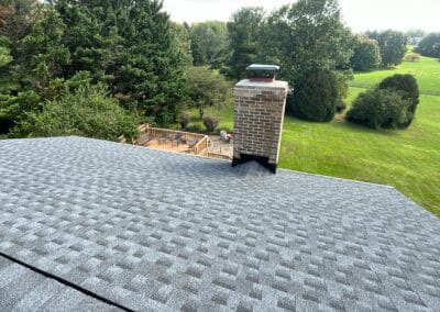 Brand new look of roof with GAF Timberline HDZ architectural shingles in Pewter Gray