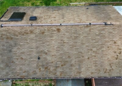 Before look of roof before roof replacement with signs of aging