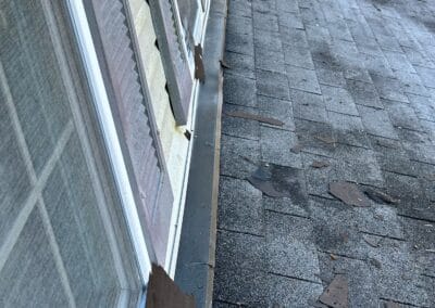 Before look of roof with shingle wear