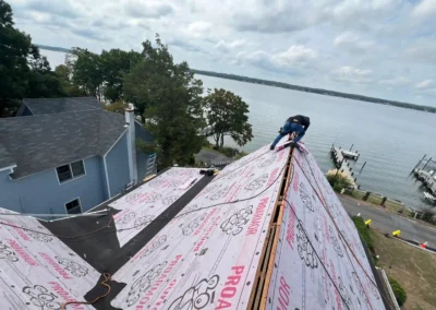 Can You Replace a Roof Yourself Risks vs. Savings featured img