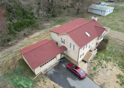 After look of project with GAF's Patriot Red shingles