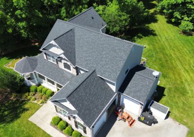 After look of roof replacement with Owens Corning Duration shingles in Onyx Black