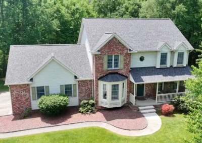 After look of roof replacement with Roof replacement in Slippery Rock, PA using Owens Corning Duration shingles in Williamsburg Gray with DuraRidge vents.