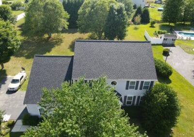 After look of roof replacement with Owens Corning Duration shingles in Williamsburg Gray