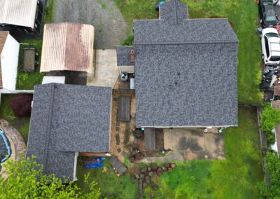 After look of roof replacement project with Owens Corning Duration shingles in Midnight Plum