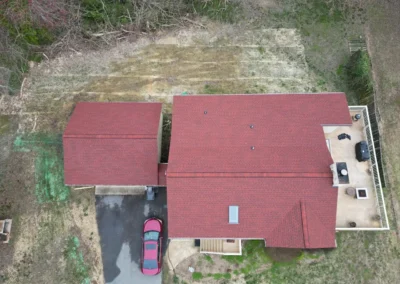 After look of project with GAF's Patriot Red shingles