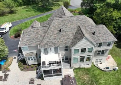 After look of project with roof shingles of Owens Corning Aged Copper