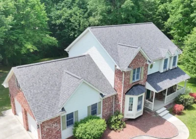 After look of roof replacement with Roof replacement in Slippery Rock, PA using Owens Corning Duration shingles in Williamsburg Gray with DuraRidge vents.