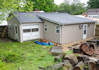 After look of roof replacement project with Owens Corning Duration shingles in Midnight Plum