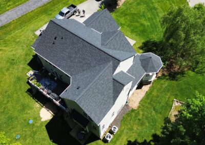After look of roof replacement with Owens Corning Duration shingles in Onyx Black