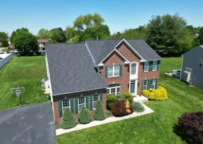 After look of roof with new Owens Corning Duration shingles in Onyx Black
