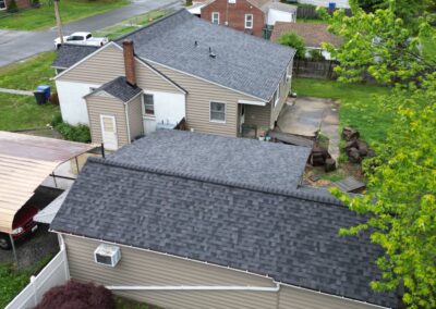 After look of roof replacement project with Owens Corning Duration shingles in Midnight Plum