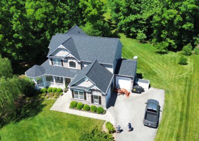 After look of roof replacement with Owens Corning Duration shingles in Onyx Black