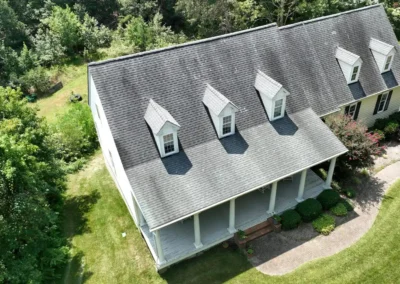 Before look of roof with signs of shingle wear