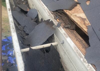 Before look of roof with signs of roof damage