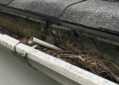 Before look of project with signs of shingle damage