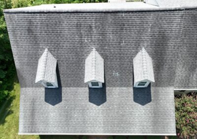 Before look of roof with signs of shingle wear