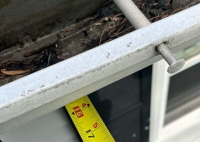 Before look of project with signs of shingle damage