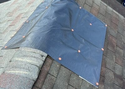 Before look of project with signs of shingle damage