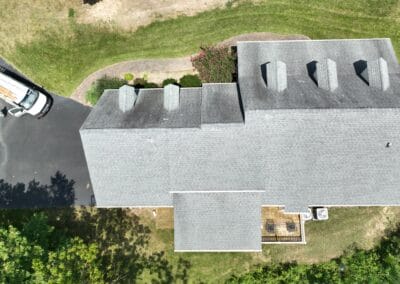 Before look of roof with signs of shingle wear