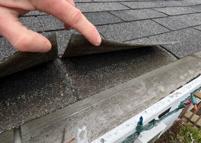 Before look of the project with signs of shingle damage