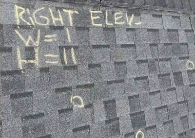 Before look of roof with signs of shingle damage