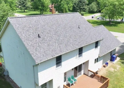 After look of roof replacement with Roof replacement in Slippery Rock, PA using Owens Corning Duration shingles in Williamsburg Gray with DuraRidge vents.