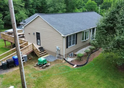 After look of project with CertainTeed Main Street D5DL siding in Natural Clay