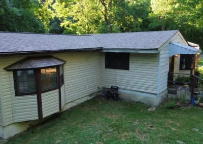 After look of the house with Owens Corning Duration shingles in Sand Castle