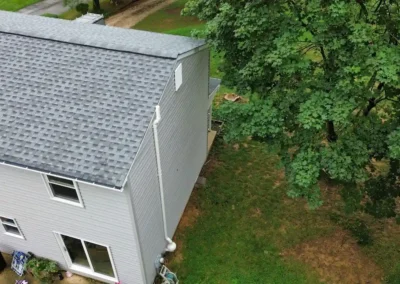After look of project with roof having GAF Timberline HDZ shingles in Pewter Gray