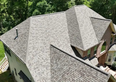 After look of project with roof having Owens Corning Duration shingles in Driftwood