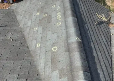 Before look of roof with signs of shingle wear