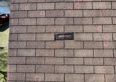 Before look of roof with signs of shingle damage