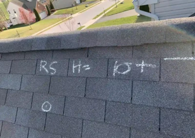 Before look of roof with signs of shingle degradation