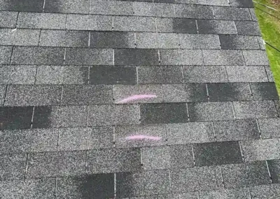 Before look of the project with signs of shingle damage