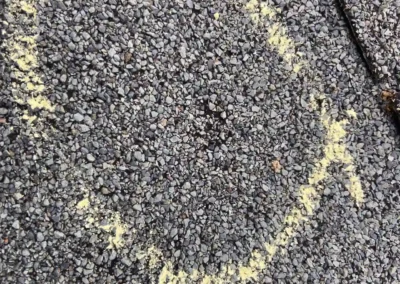 Before look of roof with signs of shingle wear