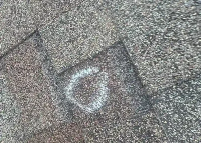 Before look of roof with signs of shingle wear