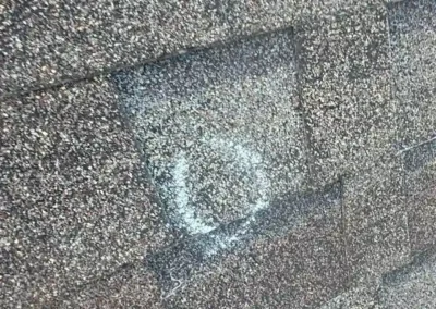 Before look of roof with signs of shingle wear