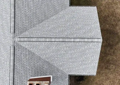 Finished look of roof with GAF Timberline HDZ shingles in Birchwood