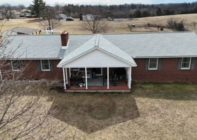 Finished look of roof with GAF Timberline HDZ shingles in Birchwood