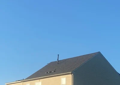 After look of roof with Owens Corning Duration shingles in Midnight Plum