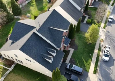 After look of project with roof having GAF Timberline HDZ roofing system in Charcoal