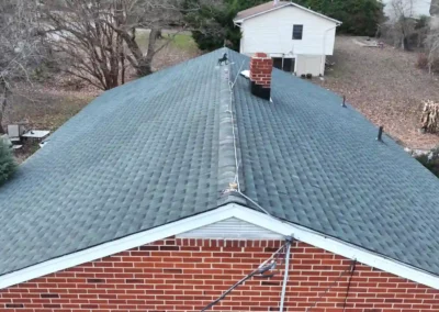 After look of roof with the brand-new GAF Timberline HDZ shingles in Hunter Green