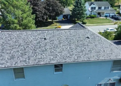 After look of roof with Owens Corning Duration shingles in Midnight Plum