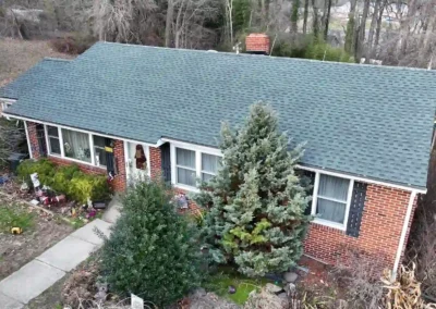 After look of roof with the brand-new GAF Timberline HDZ shingles in Hunter Green
