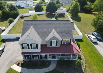 After look with the roof having the GAF Timberline HDZ architectural shingles in Williamsburg Slate