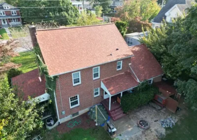 After look of roof replacement with Terra Cotta shingles by Owens Corning