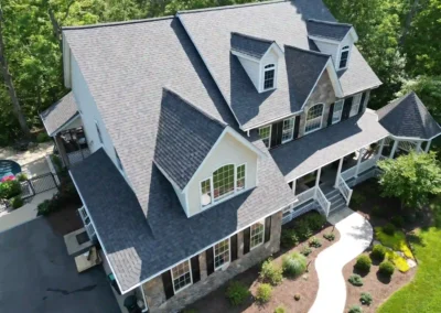 After look of project with the roof having Owens Corning Duration shingles in Williamsburg Grey