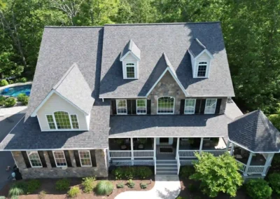 After look of project with the roof having Owens Corning Duration shingles in Williamsburg Grey