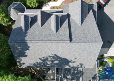 After look of project with the roof having Owens Corning Duration shingles in Williamsburg Grey